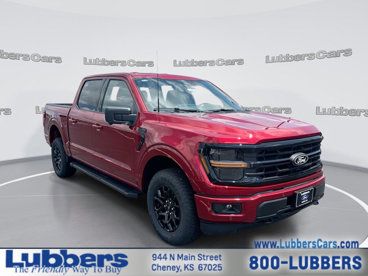 2026 Ford F-150 XLT in Ruby Red Metallic Tinted — front three-quarter view