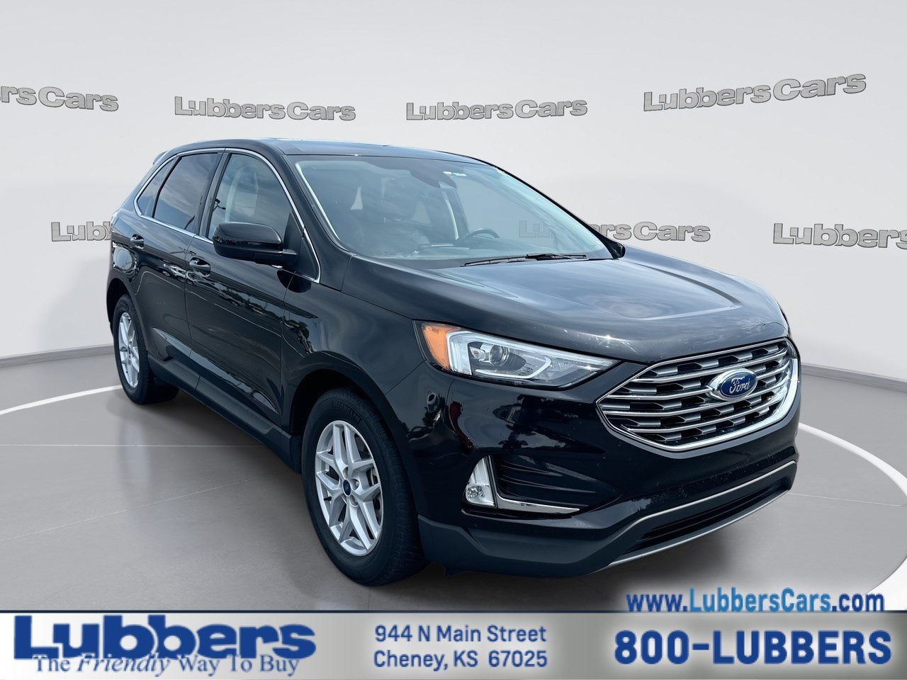 2021 Ford Edge SEL in Agate Black Metallic — front three-quarter view