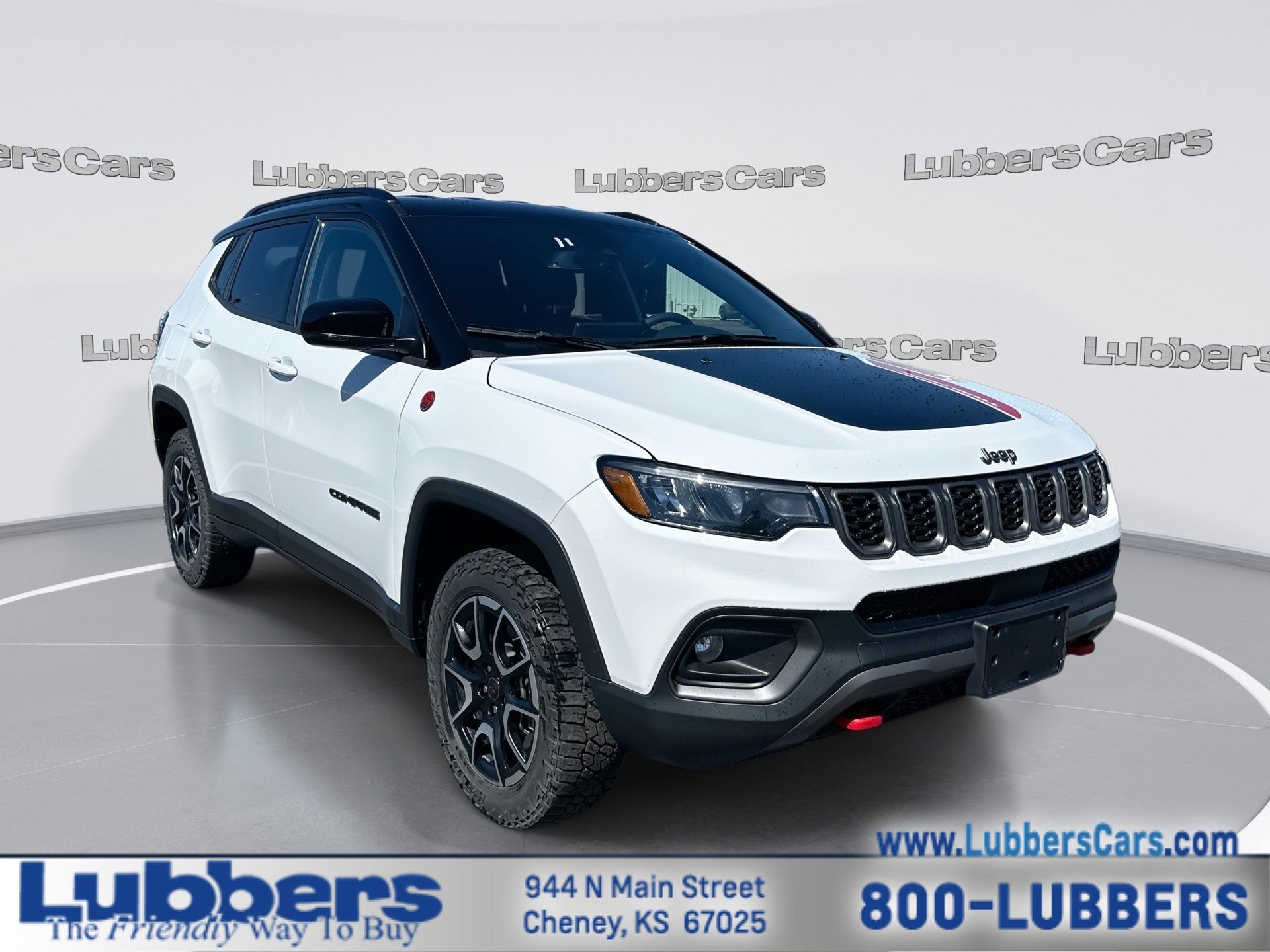 2025 Jeep Compass Trailhawk in Bright White Clearcoat — front three-quarter view