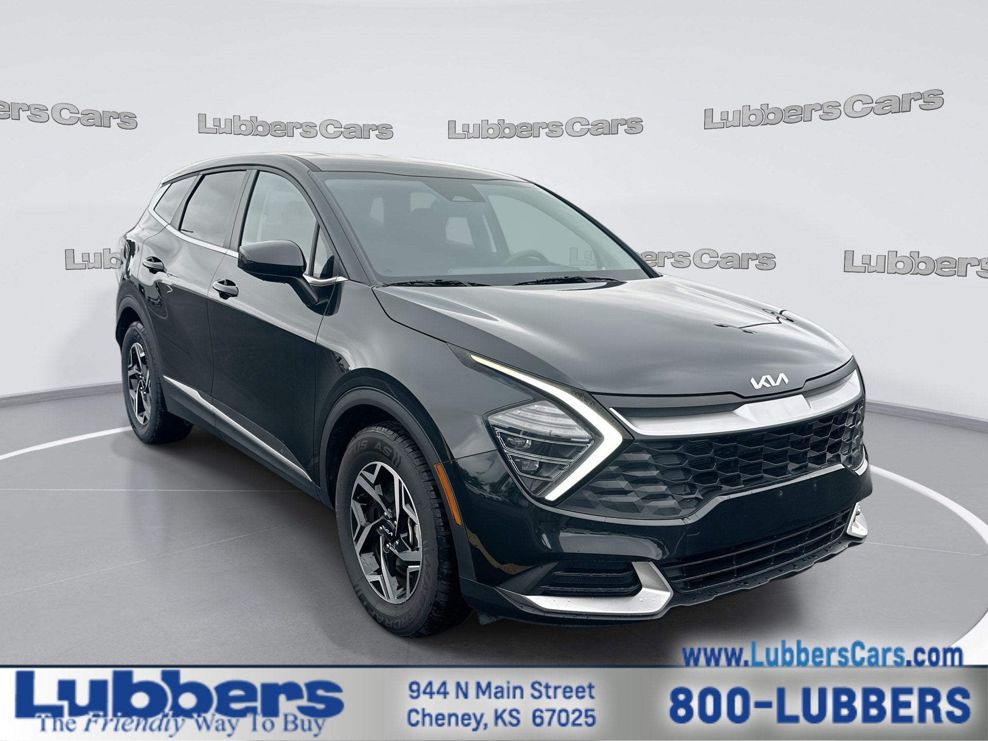 2024 Kia Sportage LX in Fusion Black — front three-quarter view